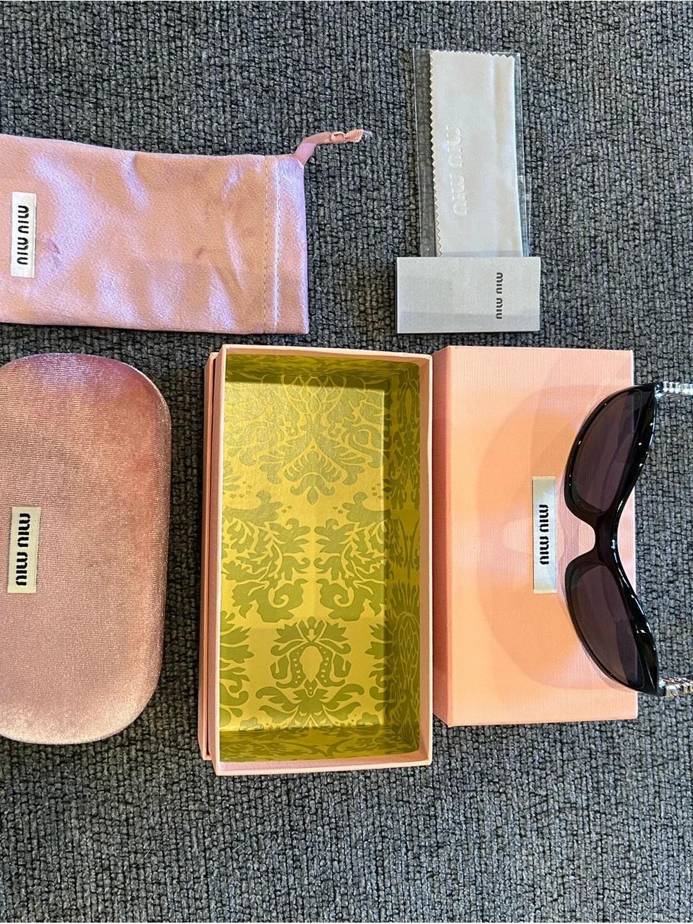 Miu Miu Black Sunglasses with Gold Temple Accents